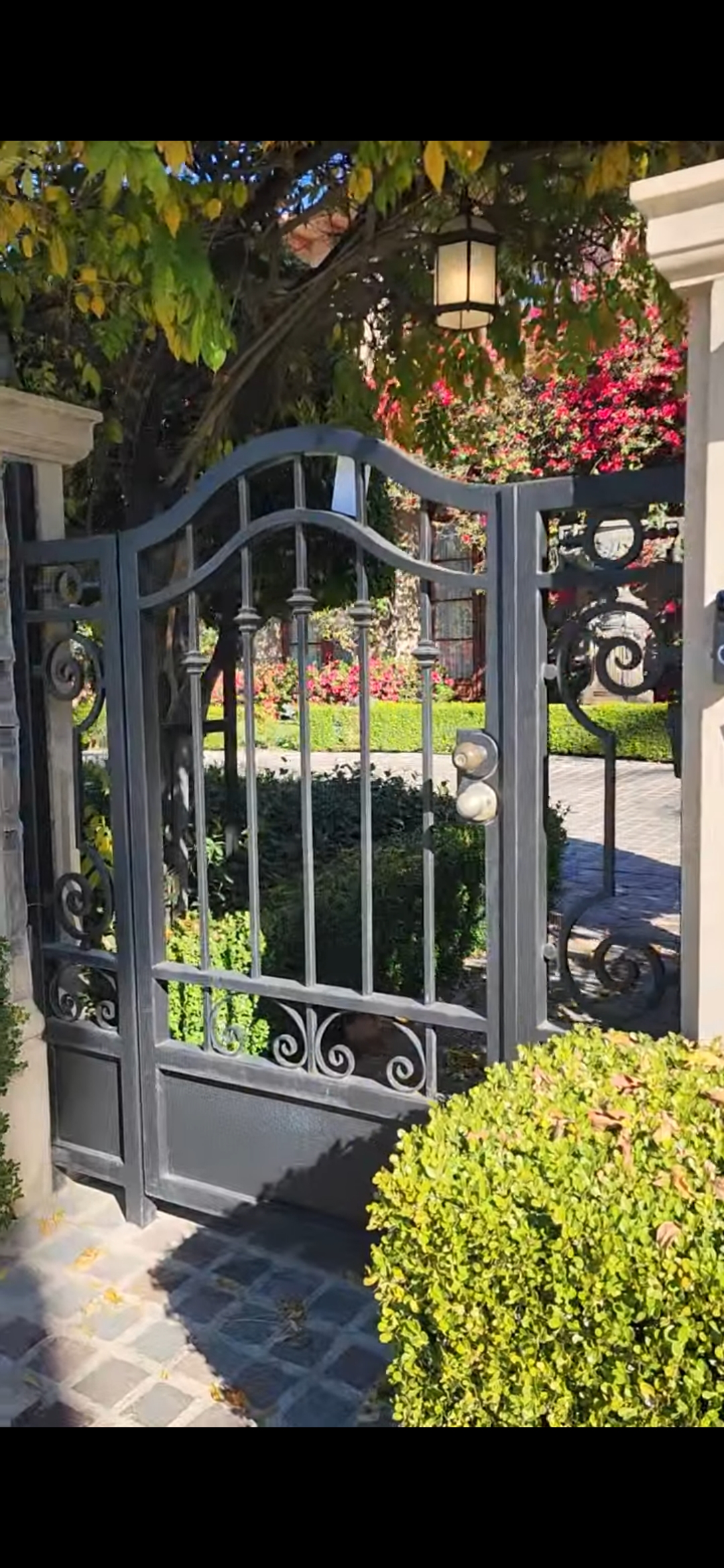 Modern horizontal slat iron gate Los Angeles